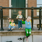 Barn iført Miffy fra Move-serien i bambus med cykel-sweatshirt og grønne joggingbukser