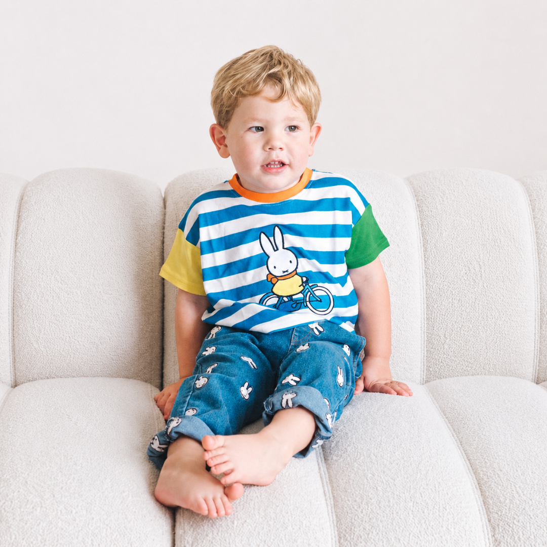 Child wearing the Miffy on the Move striped ringer children's T-shirt