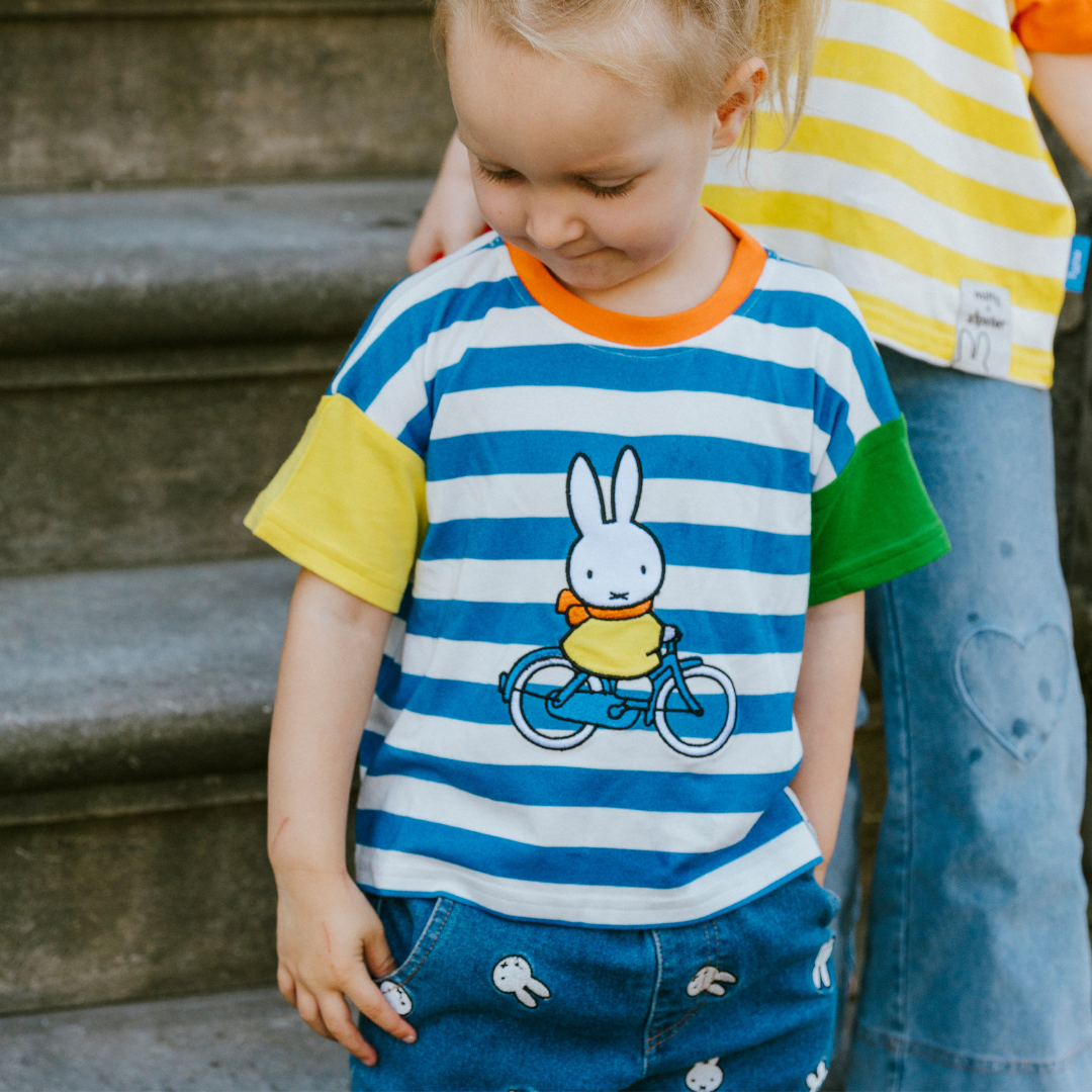 Child wearing the Miffy on the Move striped ringer children's T-shirt