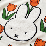 Design detail on the Miffy in the Meadow tulip print bamboo lounge set